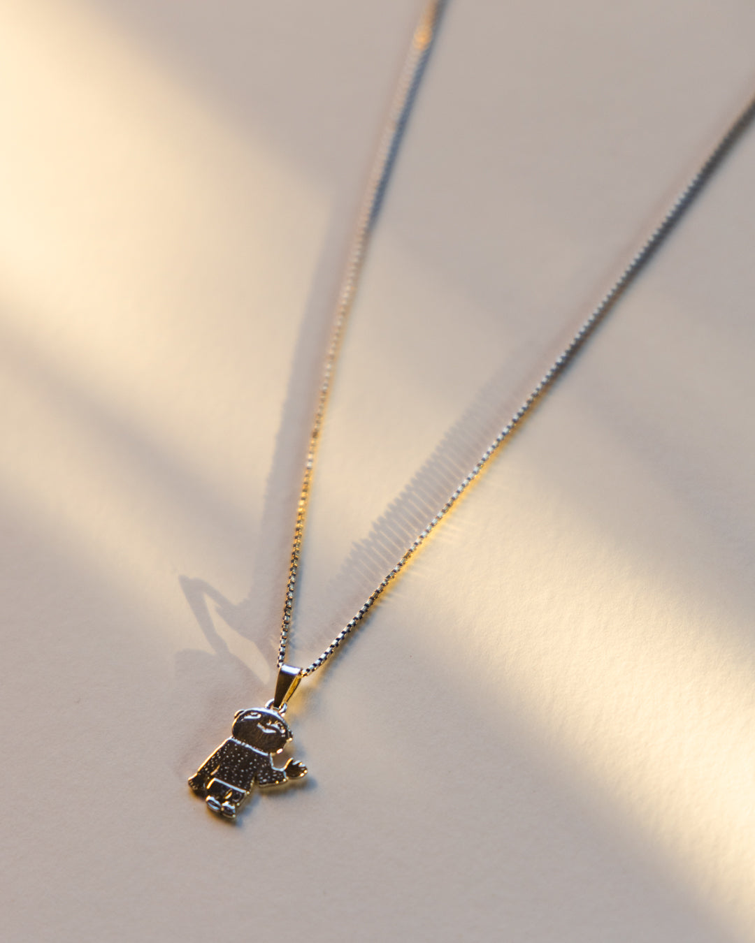 Alfie silver charm