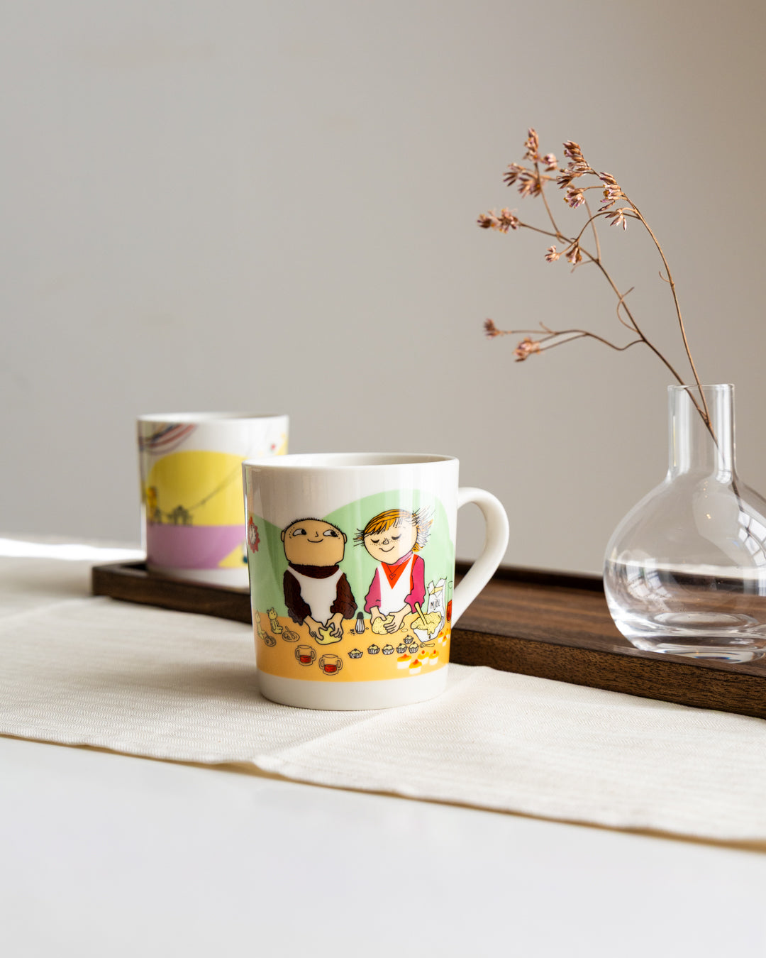Porcelain mug featuring Alfie and Milly