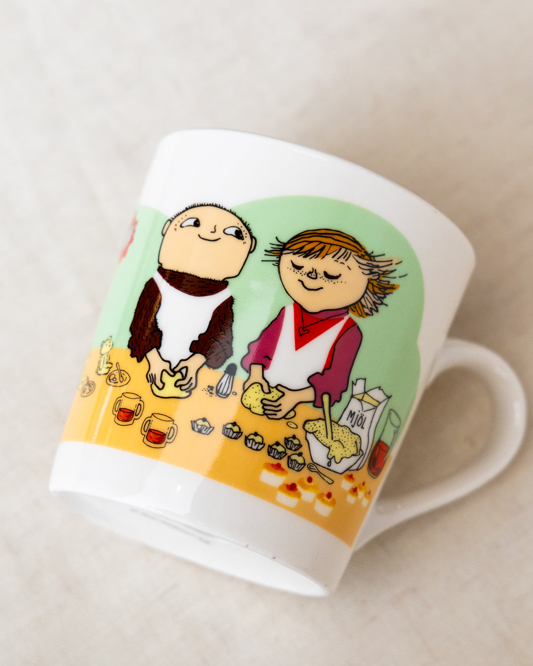 Porcelain mug featuring Alfie and Milly